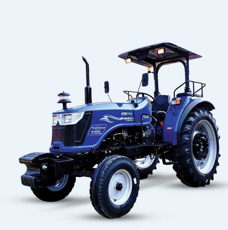 Blue farm tractor with a sun canopy